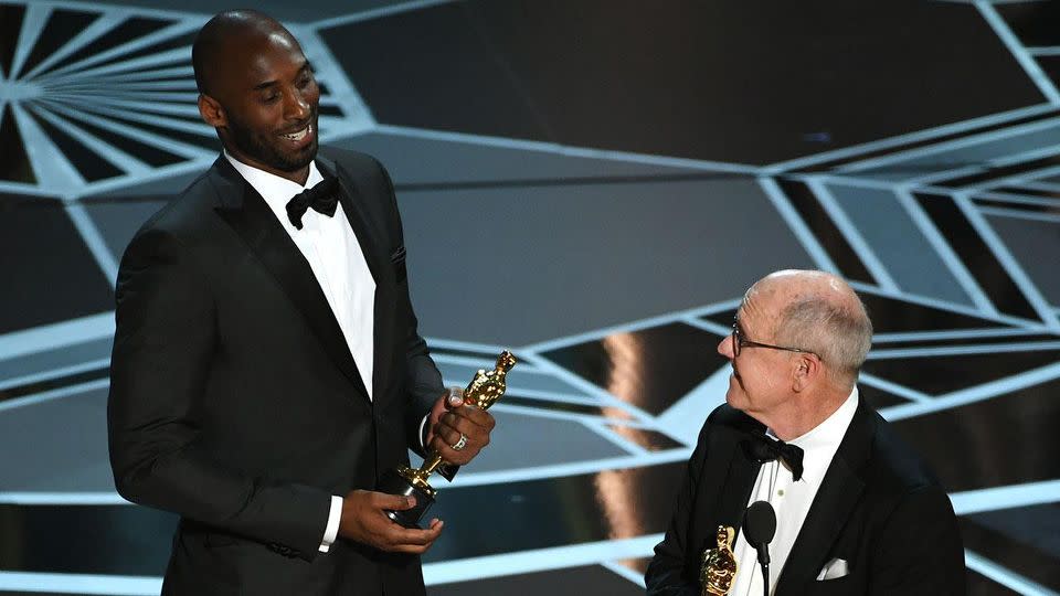 Bryant and Keane accept their award. Pic: Getty