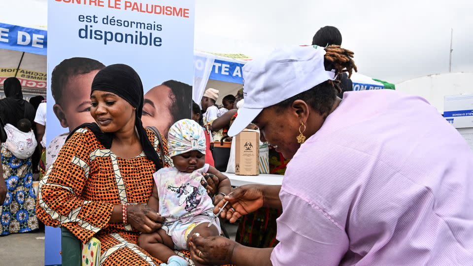 A health worker vaccinates a baby against malaria during the launch of a vaccination campaign at a commune in Abidjan, West Africa in 2024. - Sia Kambou/AFP/Getty Images