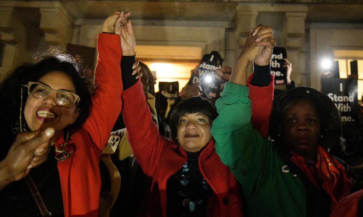 <span>Diane Abbott and supporters in front of Hackney town hall.</span><span>Photograph: Christian Sinibaldi/The Guardian</span>