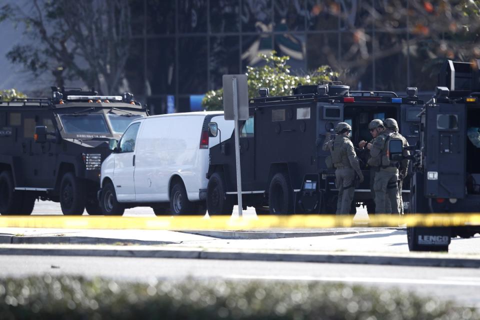 Police surround the white van in Torrance (EPA)