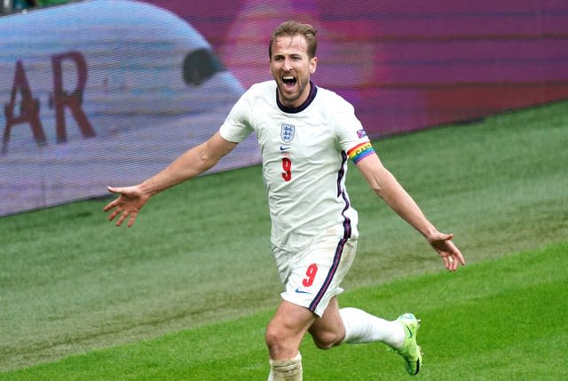 Harry Kane celebrates scoring for England