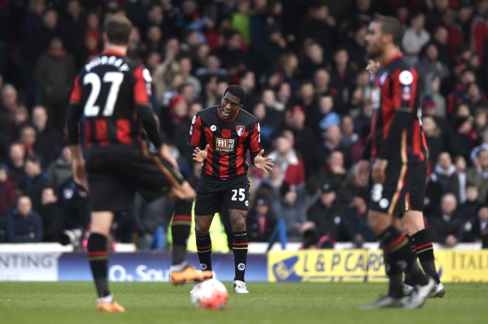 Football Soccer - Portsmouth v AFC Bournemouth - FA Cup Fourth Round - Fratton Park - 30/1/16 Bournemouth's Sylvain Distin encourages teammates after Portsmouth's Gary Roberts (not pictured) scored their first goal Action Images via Reuters / Adam Holt Livepic EDITORIAL USE ONLY. No use with unauthorized audio, video, data, fixture lists, club/league logos or "live" services. Online in-match use limited to 45 images, no video emulation. No use in betting, games or single club/league/player publications. Please contact your account representative for further details.