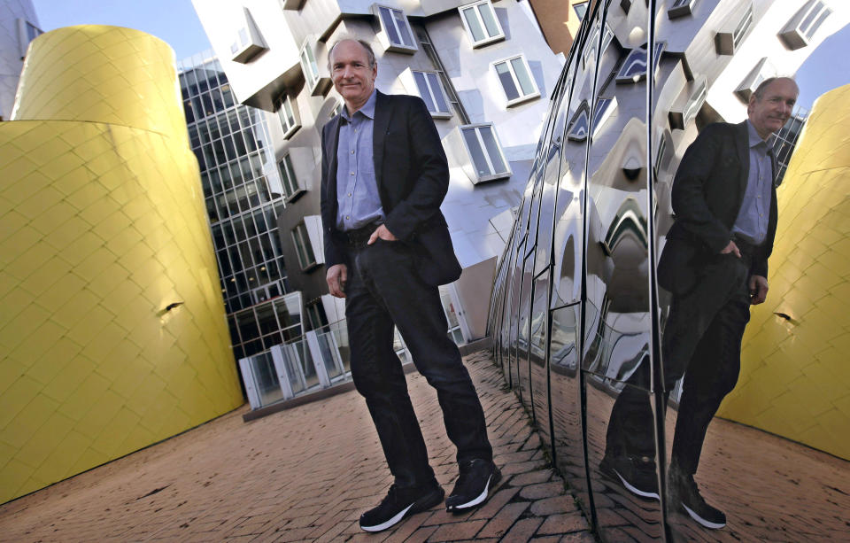 In this Monday, April 3, 2017, photo, Tim Berners-Lee poses outside his office at the Massachusetts Institute of Technology in Cambridge, Mass. Berners-Lee, best known as the inventor of the World Wide Web, is this year's recipient of the A.M. Turing Award, computing's version of the Nobel Prize. The honor comes with a $1 million prize funded by Google, one of many companies that made a fortune thanks to Berners-Lee's efforts to make the internet more accessible and useful. (AP Photo/Charles Krupa)