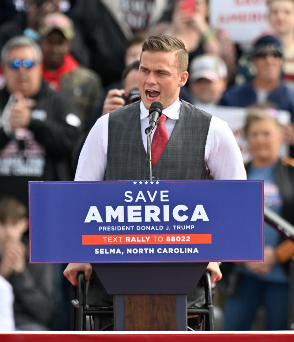 Rep. Madison Cawthorn speaking a rally.