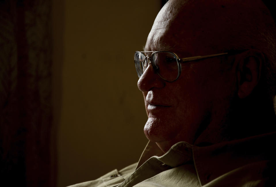 Donn Edmunds, a 25-year U.S. Army veteran who served in Vietnam, sits in his living room in Cheyenne, Wyo., Wednesday, Sept. 1, 2021. Edmunds' son, Army Ranger Spc. Jonn Edmunds, and another soldier died when a Black Hawk helicopter on a search-and-rescue mission crashed in Pakistan in October 2001. They were among the first U.S. casualties in the Afghanistan war. (AP Photo/Thomas Peipert)