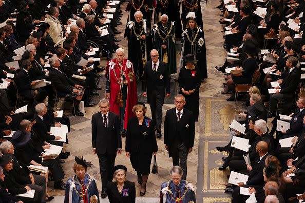 LONDON, ENGLAND - SEPTEMBER 19: Guests arrive for the State Funeral of Queen Elizabeth II, held at Westminster Abbey, on September 19, 2022 in London, England.  Elizabeth Alexandra Mary Windsor was born in Bruton Street, Mayfair, London on 21 April 1926. She married Prince Philip in 1947 and ascended the throne of the United Kingdom and Commonwealth on 6 February 1952 after the death of her Father, King George VI. Queen Elizabeth II died at Balmoral Castle in Scotland on September 8, 2022, and is succeeded by her eldest son, King Charles III. (Photo by Dominic Lipinski - WPA Pool/Getty Images)