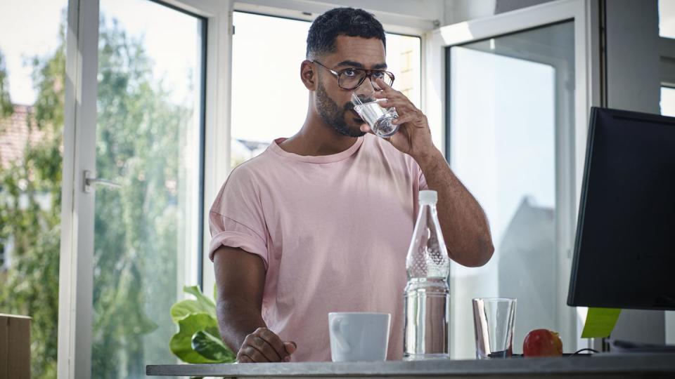 businessman drinking water