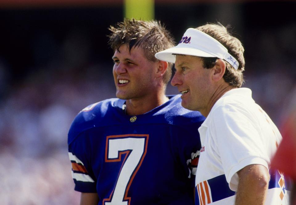 Florida coach Steve Spurrier (right) and quarterback Danny Wuerffel (7) talk on the sidelines during the 1995 season. (USA TODAY Sports)