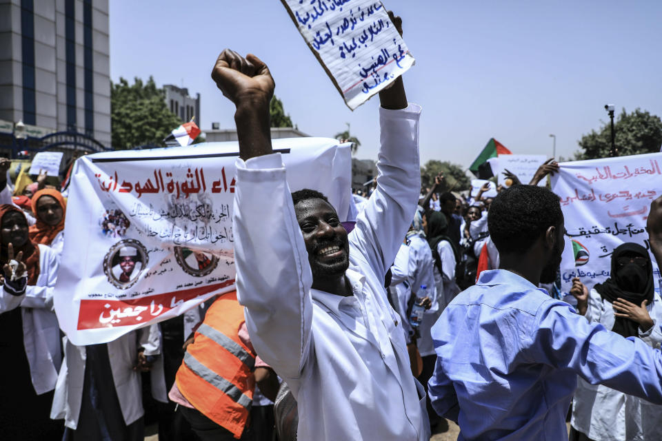 Sudanese demonstrators march at a rally outside the army headquarters in the Sudanese capital Khartoum on Wednesday, April 17, 2019. A Sudanese official and a former minister said the military has transferred ousted President Omar al-Bashir to the city's Kopar Prison in Khartoum. The move came after organizers of the street protests demanded the military move al-Bashir to an official prison. (AP Photo)