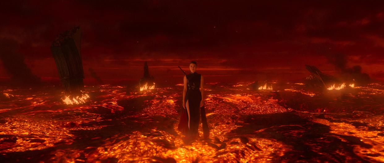 sophon in three body problem, a woman in a black dress with a sword strapped to her back, walking through a sea of lava and flame. she looks threatening and powerful