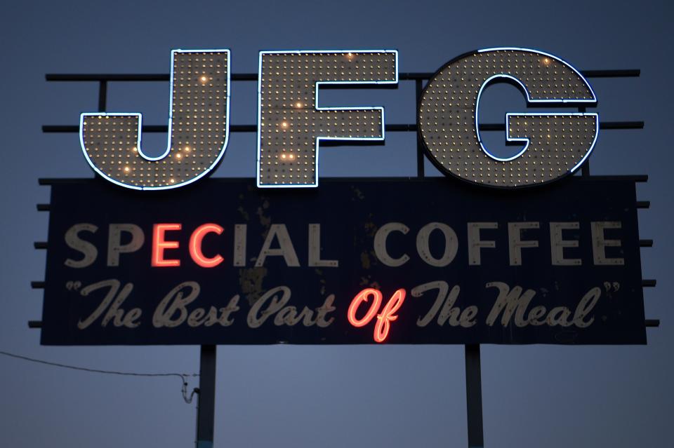 The JFG sign in South Knoxville, which moved to its current location on Sevier Avenue in 2012, has routinely lost its shine as bulbs and neon lights have faded out over time. Reily Foods, which owns JFG and leases the land, plans to refurbish the sign but is first waiting to see if the property gets sold.