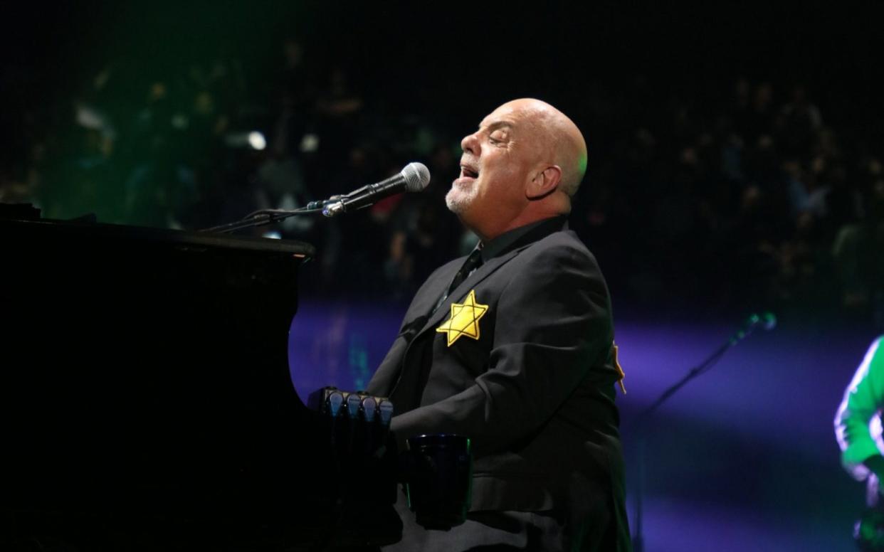 Billy Joel wears a jacket with the Star of David during the encore of his 43rd sold out show at Madison Square Garden on August 21, 2017 in New York City - Getty Images North America