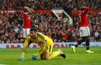 <p>Tottenham’s Hugo Lloris looks on while Manchester United’s Romelu Lukaku reacts to a missed chance</p>