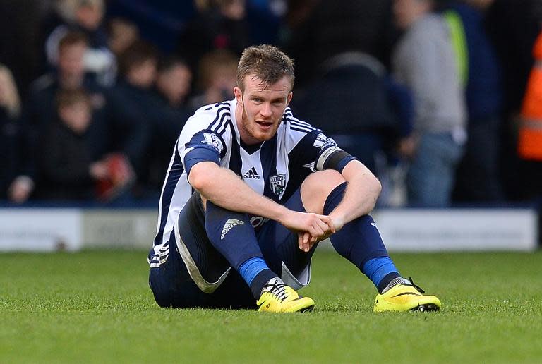 West Bromwich Albion's Chris Brunt, seen at the final whistle during their English Premier League match against Tottenham Hotspur, at The Hawthorns in West Bromwich, on April 12, 2014