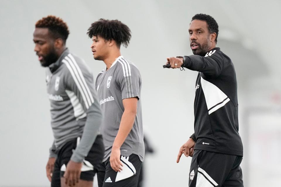 Jan 11, 2023; Columbus, Ohio, USA;  Columbus Crew head coach Wilfried Nancy directs midfielder Kevin Molino, left, and forward Jacen Russell-Rowe during training at the OhioHealth Performance Center. Mandatory Credit: Adam Cairns-The Columbus Dispatch