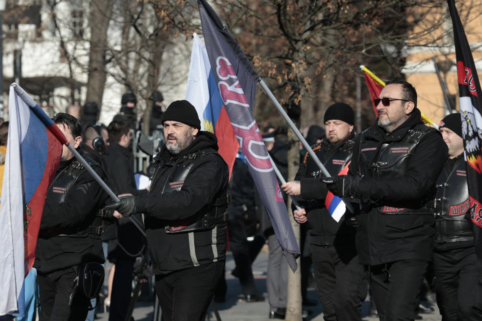 Members of Russian motorcycle club "Night Wolves" march during a parade marking the 27th anniversary of the Republic of Srpska in the Bosnian town of Banja Luka, Wednesday, Jan. 9, 2019. In a show of nationalist defiance, Bosnian Serbs are celebrating a controversial holiday despite strong opposition from other ethnic groups in Bosnia who view it as discriminatory. Waving Serb flags, several thousand people on Wednesday lined up in the main Serb city of Banja Luka to watch a celebratory parade of security troops, firefighters, cultural and sport groups. (AP Photo/Amel Emric)