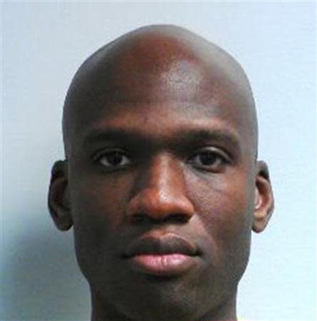 Aaron Alexis, who the FBI believe to be responsible for the shootings at the Washington Navy Yard in the Southeast area of Washington, DC, is shown in this handout photo released by the FBI on September 16, 2013. REUTERS/FBI/Handout via Reuters