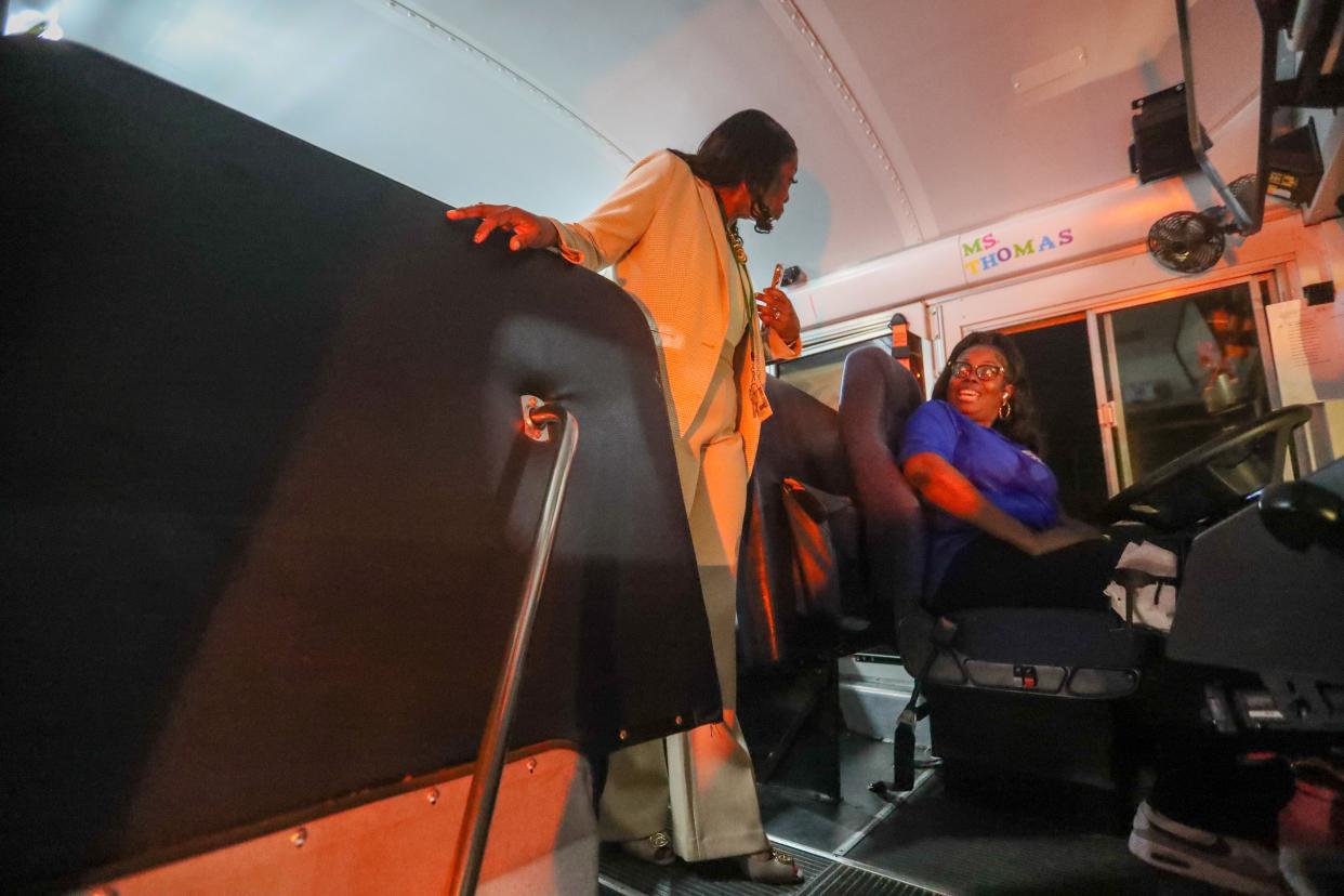 New Superintendent Denise Watts talks with a bus driver at the SCCPSS Transportation Facility as they prepare to go out for the first day of the 2023-24 school year on Thursday, August 3, 2023.