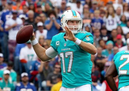 Miami Dolphins quarterback Ryan Tannehill (17) looks to make a pass during the first half against the Buffalo Bills at Ralph Wilson Stadium. Mandatory Credit: Timothy T. Ludwig-USA TODAY - RTR466HO