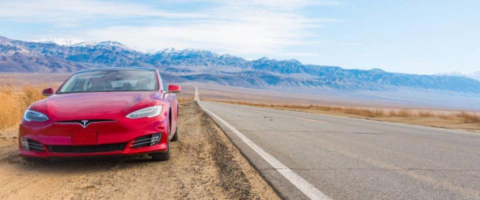 Tesla on the side of a road