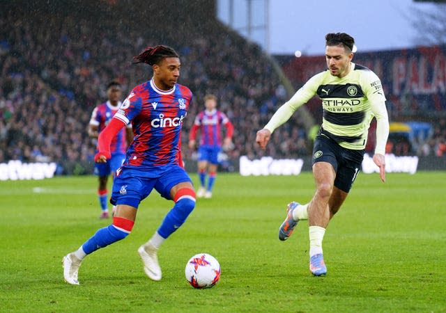 Crystal Palace’s Michael Olise (left) and Manchester City’s Jack Grealish (Zac Goodwin/PA)