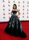 <p>La anfitriona de la alfombra roja lució un elegante diseño de Michael Cinco sin mangas y con un llamativo estampado de mariposas en tonos metálicos. La voluminosa falda también contó con pedrería.<br>EFE / NINA PROMMER </p>