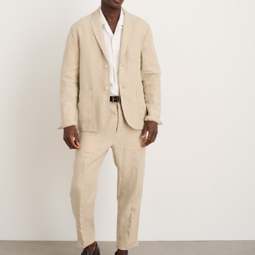 man wearing Alex Mill Mercer suit in beige