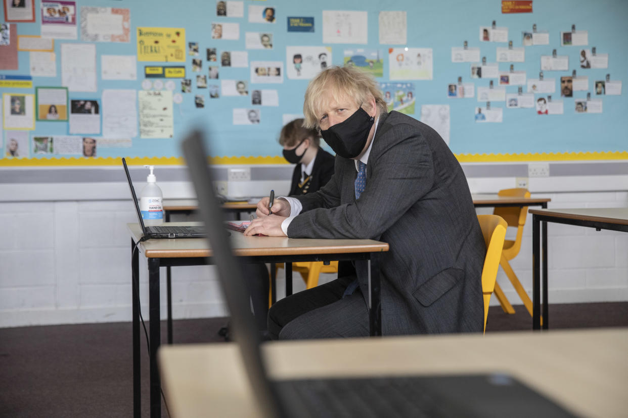 LONDON, ENGLAND - FEBRUARY 23: Prime Minister Boris Johnson visits Sedgehill School in south east London and takes part in an online class on February 23, 2021 in London, England. (Photo by Jack Hill - WPA Pool/Getty Images)