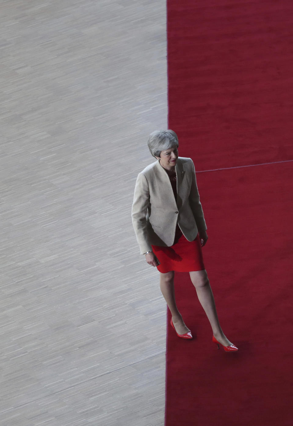 British Prime Minister Theresa May walks away after speaking with the media as she arrives for an EU summit in Brussels, Tuesday, May 28, 2019. European Union leaders are meeting in Brussels to haggle over who should lead the 28-nation bloc's key institutions for the next five years after weekend elections shook up Europe's political landscape. (AP Photo/Francisco Seco)