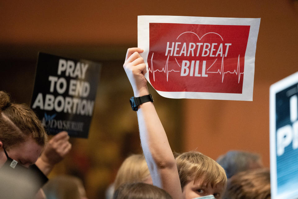 A demonstrator in Columbia, South Carolina, in February holds up a sign in favor of the state's six-week abortion ban. (Photo: SOPA Images via Getty Images)