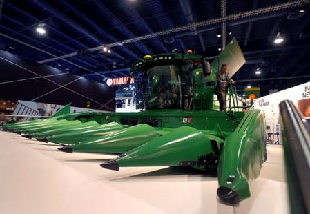 FILE PHOTO: A John Deere combine harvester, with self-driving capabilities and an onboard neural network, is displayed during the 2019 CES in Las Vegas