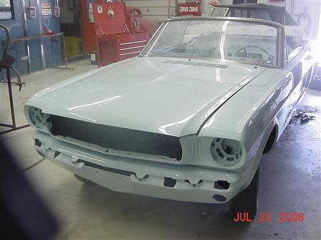 Gail Wise's Skylight Blue 1964 1/2 Ford Mustang convertible is seen with new bodywork during its restoration at a garage in Lake Bluff, Illinois July 24, 2006. Gail Wise, then using her maiden name of Gail Brown, made the first known retail purchase of a Mustang on April 15, 1964, two days before the model went on sale. REUTERS/Courtesy of Tom and Gail Wise/Handout via Reuters