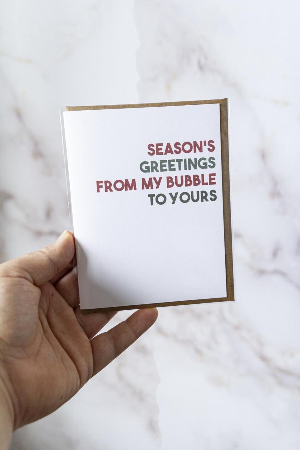 Buy it from <a href="https://www.etsy.com/listing/893905087/seasons-greetings-from-my-bubble-to" target="_blank" rel="noopener noreferrer">katushaco on Etsy</a> for $4.08