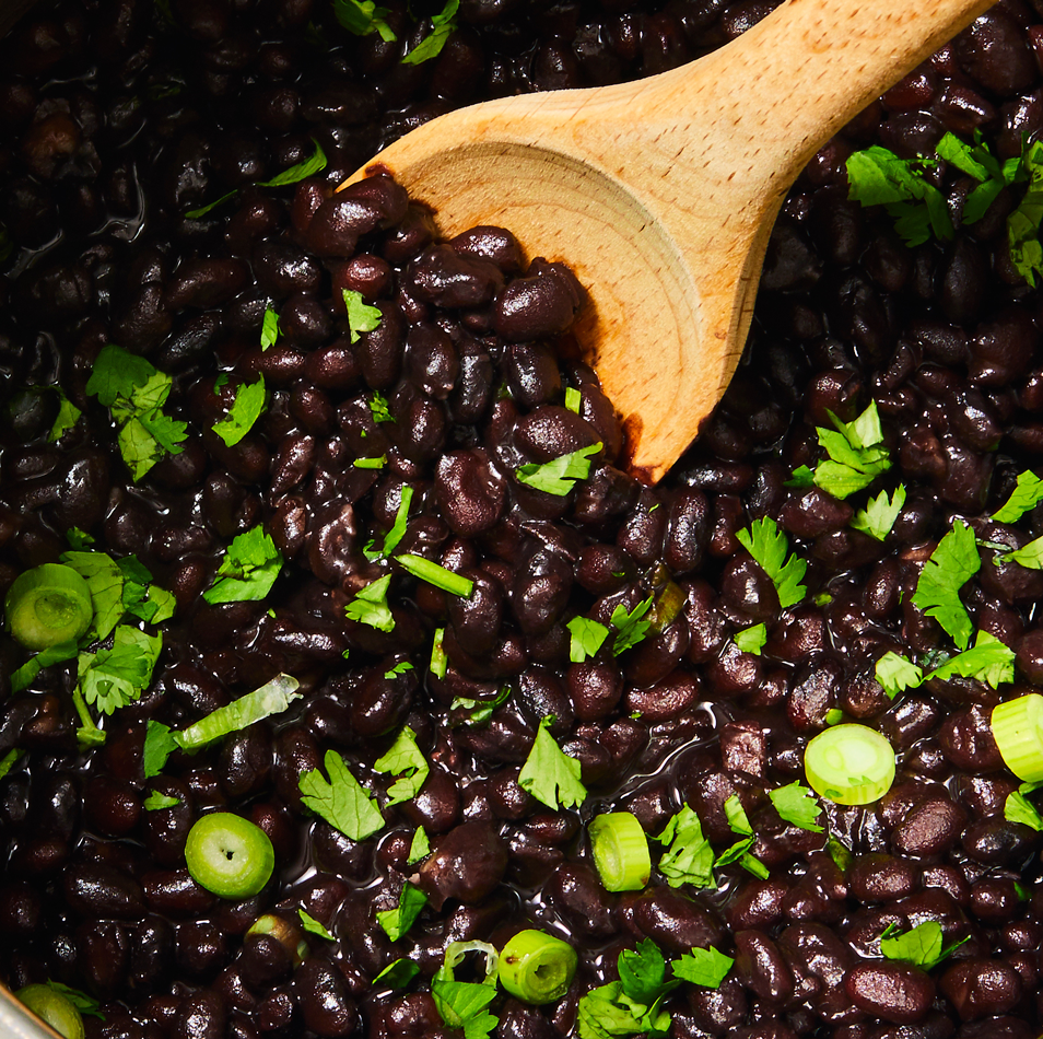 <p>Cooking with dried black beans is always better than using canned. And while it's easy to <a href="https://www.delish.com/uk/food-news/a30386378/how-to-cook-black-beans/" rel="nofollow noopener" target="_blank" data-ylk="slk:cook black beans;elm:context_link;itc:0;sec:content-canvas" class="link ">cook black beans</a>, it can take a long time and some forethought. There is no need to think ahead with the Instant Pot. You can cook dried beans in 35 minutes, meaning you can still use them in that <a href="https://www.delish.com/uk/cooking/recipes/a33344288/nacho-soup-recipe/" rel="nofollow noopener" target="_blank" data-ylk="slk:Nacho Soup;elm:context_link;itc:0;sec:content-canvas" class="link ">Nacho Soup</a> you were planning on making tonight. Easy peasy. </p><p>Get the <a href="https://www.delish.com/uk/cooking/recipes/a33344252/instant-pot-black-beans-recipe/" rel="nofollow noopener" target="_blank" data-ylk="slk:Instant Pot Black Beans;elm:context_link;itc:0;sec:content-canvas" class="link ">Instant Pot Black Beans</a> recipe.</p>