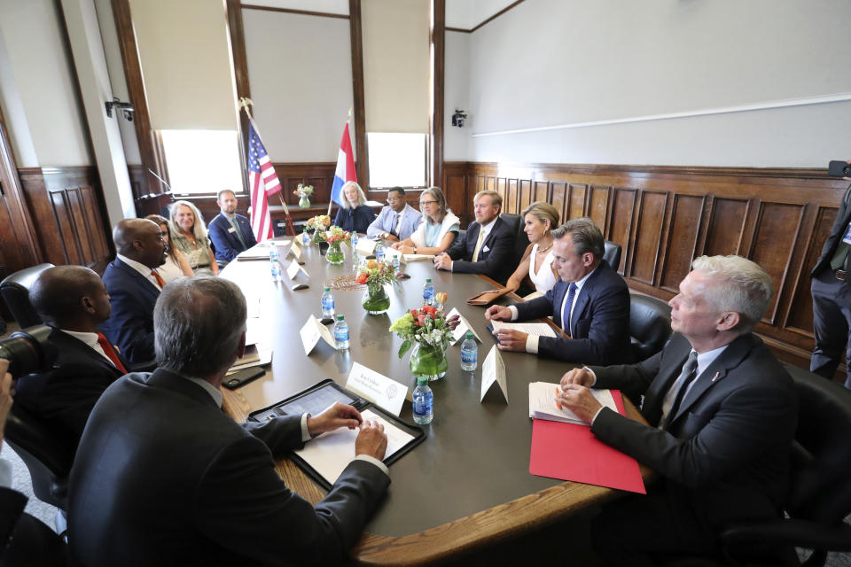 Savannah Mayor Van Johnson is joined at the conference table by King Willem-Alexander and Queen Maxima of the Netherlands along with members of their delegation on Tuesday, June 11, 2024, in Savannah, Ga. The Dutch royals spent the second day of their U.S. tour Tuesday visiting Savannah, Georgia's oldest city that is both a historic gem and a growing powerhouse in global trade. (Richard Burkhart/Savannah Morning News via AP, Pool)