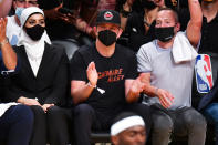 <p>Bradley Cooper claps it up courtside at the Brooklyn Nets vs. Milwaukee Bucks game at the Barclays Center in N.Y.C. on June 7.</p>