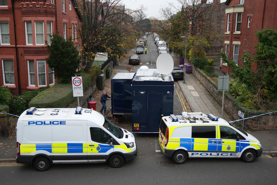 LIVERPOOL, ENGLAND - NOVEMBER 15: Police cars block the road as a control centre is set up in Rutland Avenue after properties were raided by armed officers yesterday on November 15, 2021 in Liverpool, England. A man was killed when the taxi in which he was riding exploded outside Liverpool Women's Hospital just before 11:00 AM yesterday. The driver of the taxi was injured but survived. Detectives from Counter Terrorism Police North West said three men in the Kensington area of the city were arrested under the Terrorism Act. (Photo by Christopher Furlong/Getty Images)