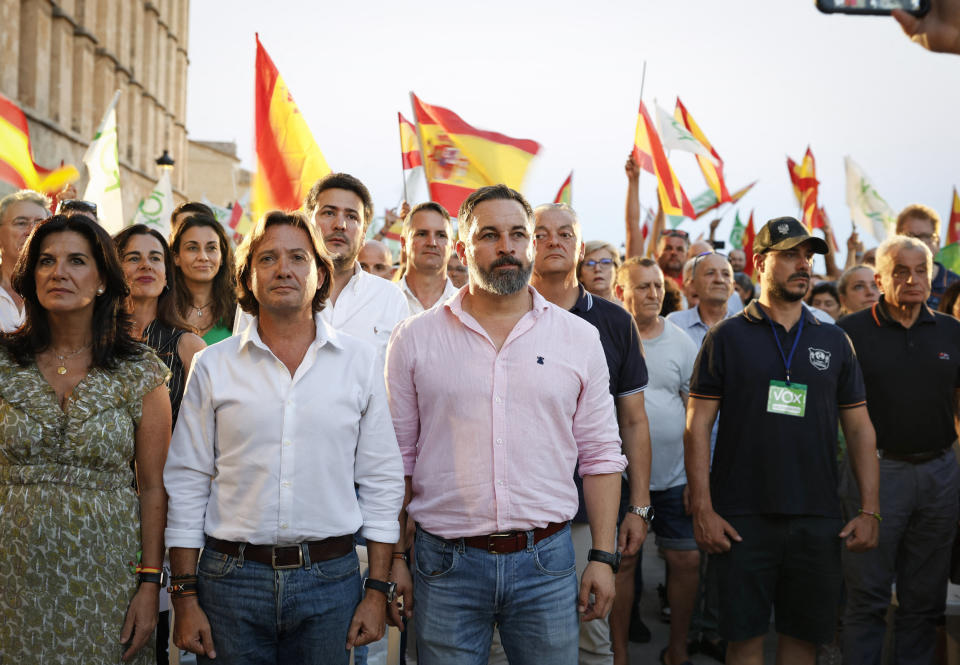 Vox party leader Santiago Abascal, center, listens to the national anthem during a campaign event in Palma de Mallorca on July 14, 2023. (Jaime Reina / AFP - Getty Images)