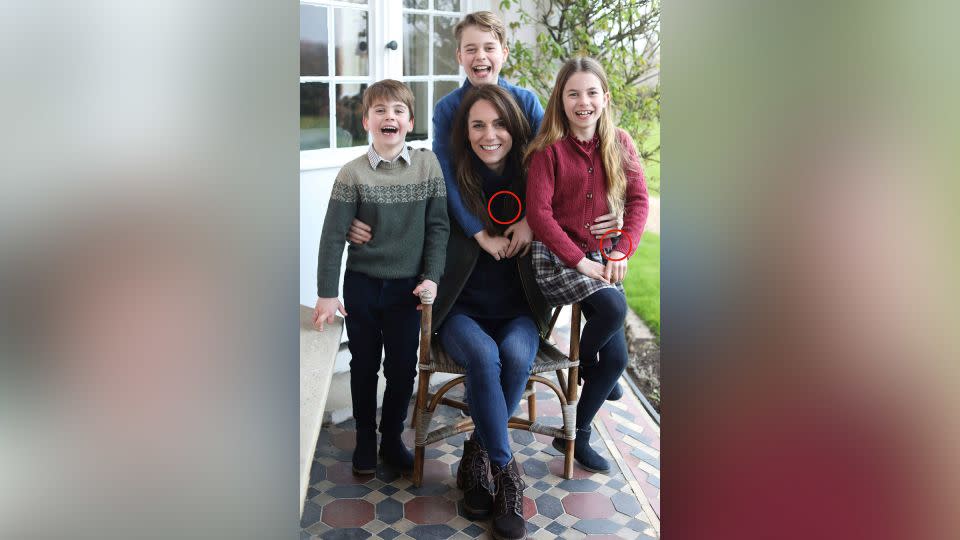 This undated photo released by Kensington Palace on March 10, 2024, shows Catherine, Princess of Wales, with her children. The circled areas appear to show evidence of potential manipulation. - Kensington Palace