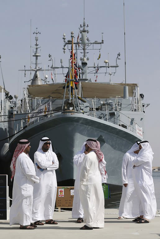 Arab visitors attend the opening of the International Defence Exhibition and Conference (IDEX) at the Abu Dhabi National Exhibition Centre in the Emirati capital on February 17, 2013. A top French defence industry official said that talks to sell Rafale jet fighters to the UAE were "progressing well", expressing confidence that a deal could be reached with the Gulf state.