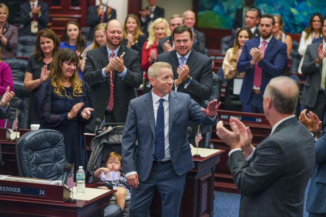 Lawmakers applaud Paul Renner as he accepts the title House Speaker-designate last year. Renner must first win reelection, and he faces Democrat Adam Morley.