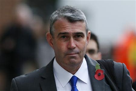 The former head of security at News International, Mark Hanna, arrives at the Old Bailey courthouse in London November 1, 2013. REUTERS/Stefan Wermuth