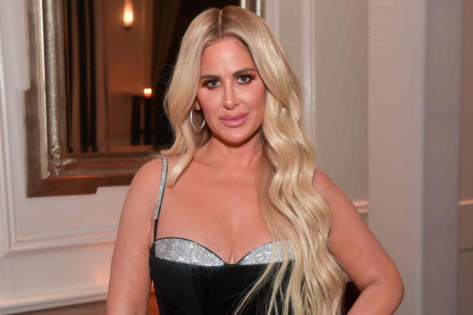 <p>Prince Williams/Wireimage</p> Kim Zolciak attends Gucci Mane Black Tie Gala at St. Regis Atlanta on February 13, 2020 in Atlanta, Georgia