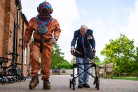 EMBARGOED TO 0001 FRIDAY SEPTEMBER 25 Captain Sir Tom Moore in Marston Moretaine, Bedford with veteran fundraiser Lloyd Scott, who will attempt to climb the Three Peaks whilst wearing a deep sea diving suit.