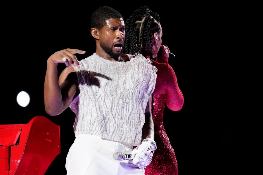 Usher and Alicia Keys perform during halftime of the NFL Super Bowl 58 football game between the San Francisco 49ers and the Kansas City Chiefs on Sunday, Feb. 11, 2024, in Las Vegas. (AP Photo/Ashley Landis)