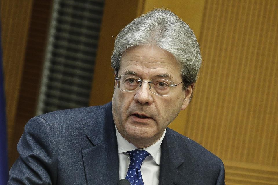 Italian Premier Paolo Gentiloni answers to journalists' questions as he holds a year-end press conference, in Rome, Thursday Dec. 29, 2016. Gentiloni said the government will take further measures to combat terrorism following the shooting death of a Tunisian fugitive near Milan, including speedier repatriation of illegal migrants. (Giuseppe Lami/ANSA via AP)