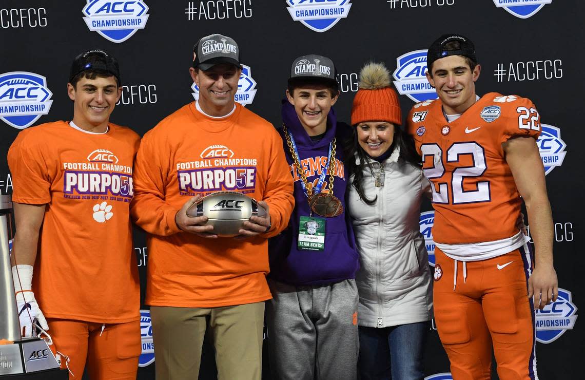 Drew Swinney, left, Clemson Head Coach Dabo Swinney, Clay Swinney, Kathleen Swinney, and Will Swinney after the Tigers beat Virginia 62-17 in the ACC Championship game at the Bank of America Stadium in Charlotte Saturday, Dec. 7, 2019.