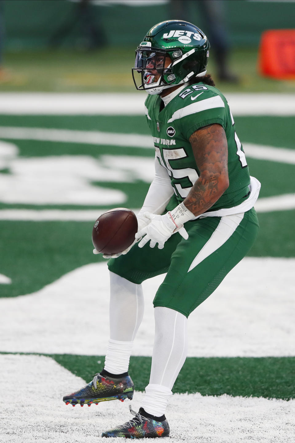 New York Jets' Ty Johnson celebrates his touchdown during the second half an NFL football game against the Las Vegas Raiders, Sunday, Dec. 6, 2020, in East Rutherford, N.J. (AP Photo/Noah K. Murray)