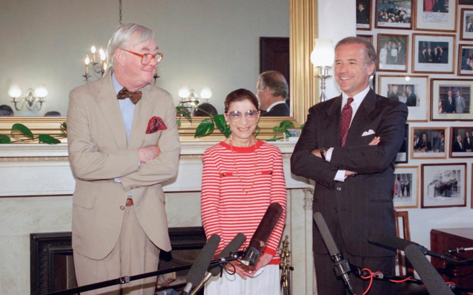 Ginsburg in 1993 with Democrat senators Pat Daniel Patrick Moynihan and Joe Biden - AP