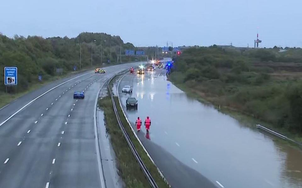 Motorists were left with no way through after rain flooded the M5